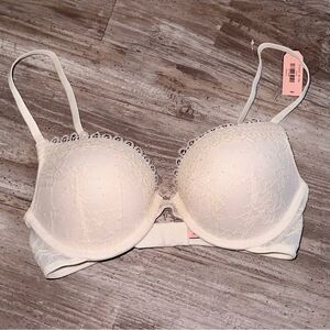 NWT DOBREVA ivory deep plunge